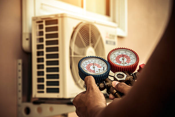 Professional Ac Installation technician working in Red Hill, PA